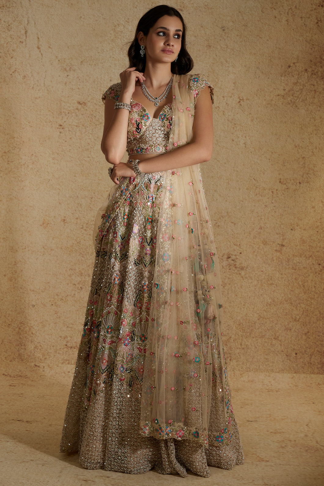 Peach net thread work lehenga