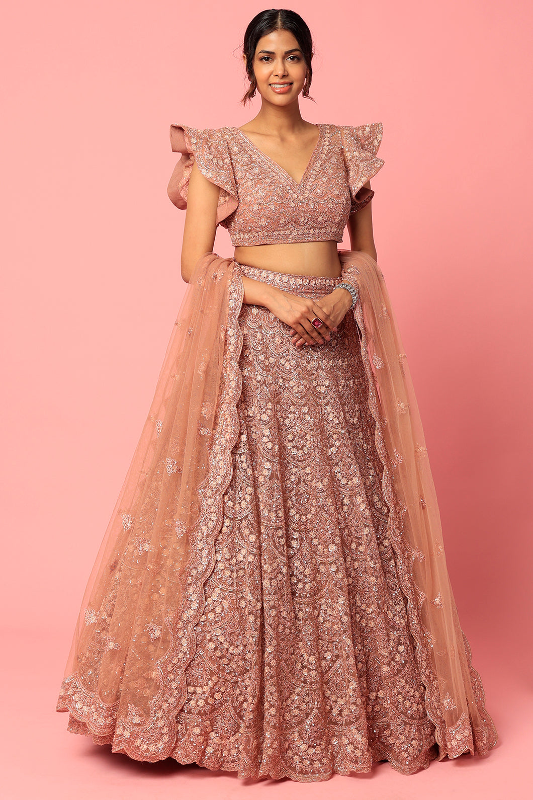 Dusty peach organza thread and seuins embroidered lehenga