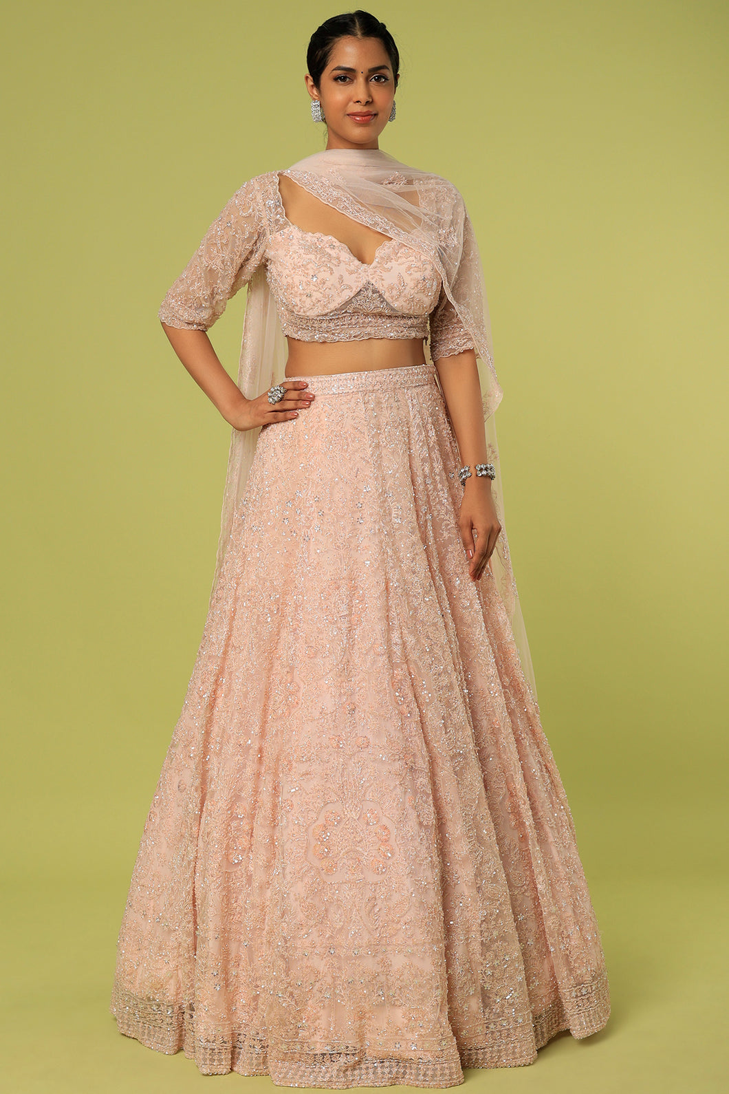 Pink net self on slef cut dana, pearl embroidered lehenga