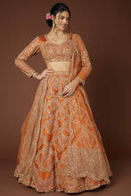 Load image into Gallery viewer, Rust raw silk hand embroidered lehenga

