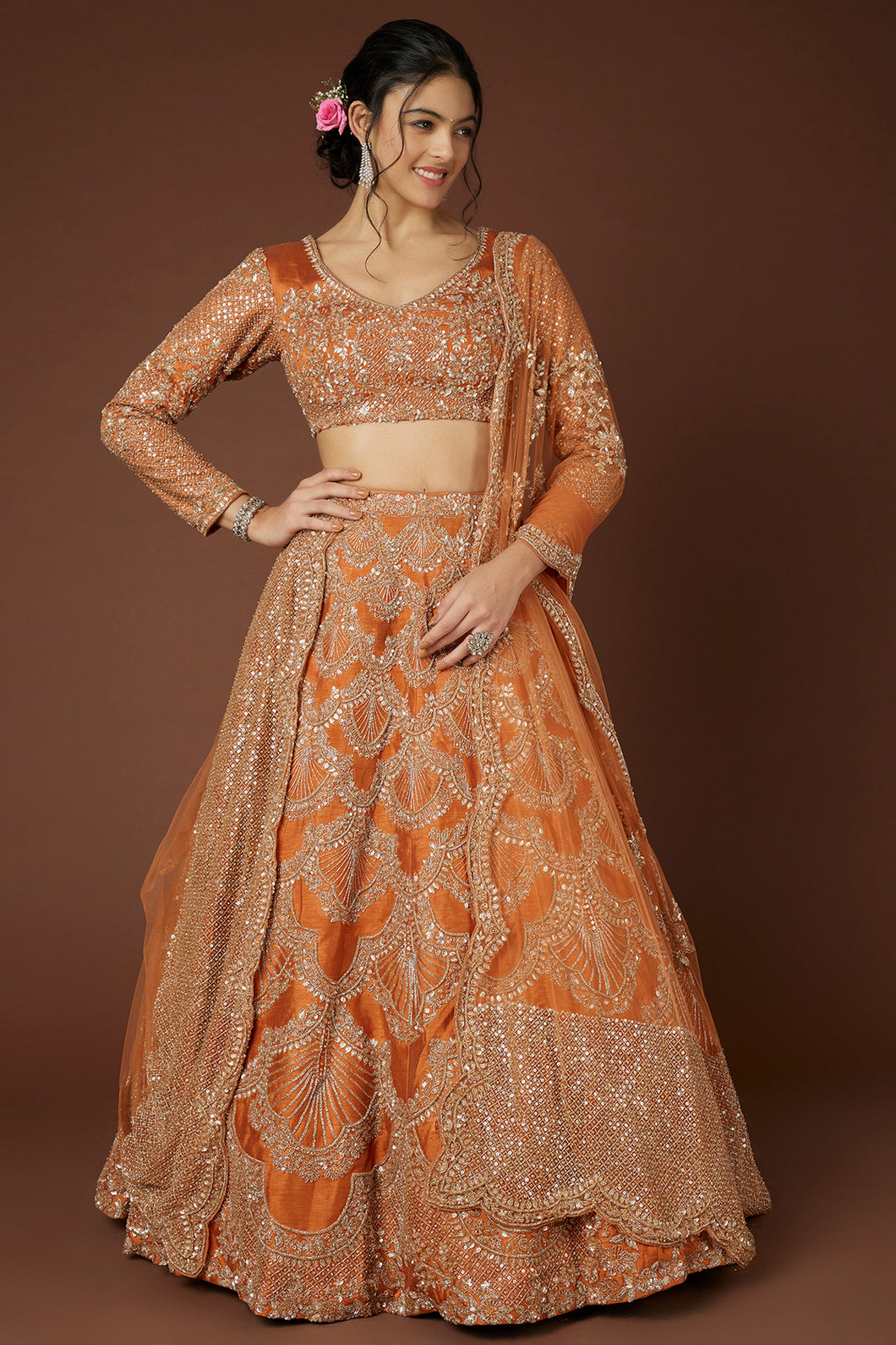 Rust raw silk hand embroidered lehenga