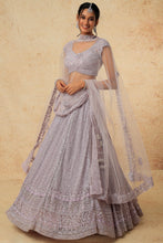 Load image into Gallery viewer, Lilac net cut dana, pearl and sequins embroidered lehenga
