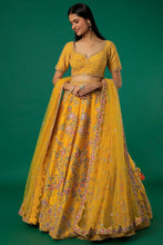 Load image into Gallery viewer, Mustard raw silk thread and zari embroidered lehenga
